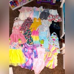 Tons of toddler dresses/shorts/shirts/shoes! Most size 4 with some 5